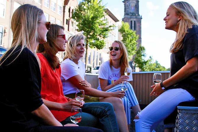 Amsterdam Open Boat Sightseeing Canal Cruise - Price, group size, and the hearing factor on the small boat