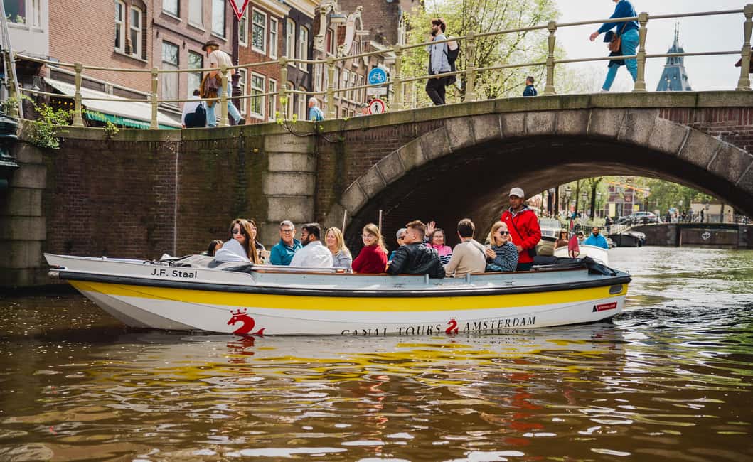 Amsterdam: Open Boat Tour of Canals with Expert Local Guide - Comfort on an open deck: what to wear and how to time your day