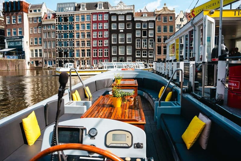 Amsterdam: Open Boat Tour of Canals with Expert Local Guide - Who this canal open-boat tour suits best