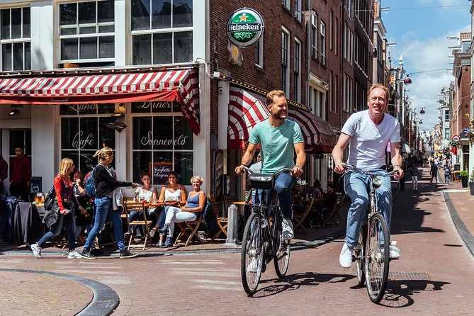 Amsterdam PRIVATE Bike Tour With Locals: Bike & Local Snack Included - Why cycling with a private local host beats solo planning
