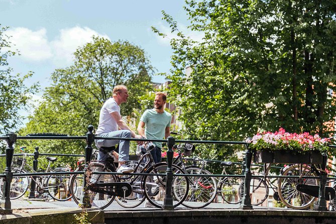 Amsterdam PRIVATE Bike Tour With Locals: Bike & Local Snack Included - Meeting at Prins Hendrikkade 14 and getting ready fast