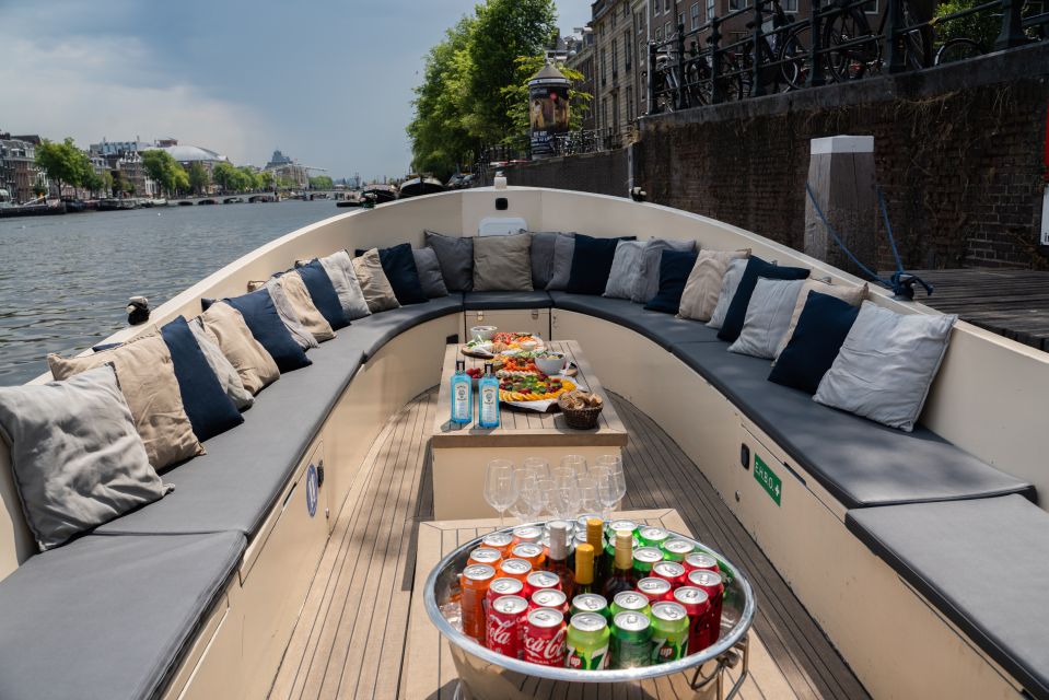 Amsterdam: Private Canal Booze Cruise with Unlimited Drinks - Private Amsterdam Canals With Unlimited Drinks: The Real Experience