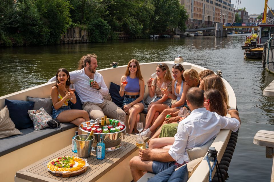 Amsterdam: Private Canal Booze Cruise with Unlimited Drinks - Unlimited Beer, Wine, and Soda: What to Expect From the Open Bar