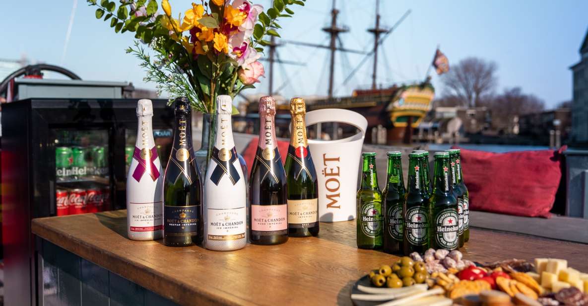 Amsterdam: Private Canal Cruise with Drinks and Snacks - What you get onboard: drinks, bitterballen, and comfort in real weather