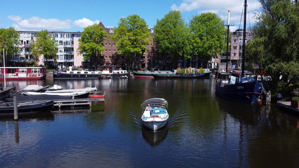 Amsterdam: Private Canal Tour - Why a small electric canal boat beats the big cruise