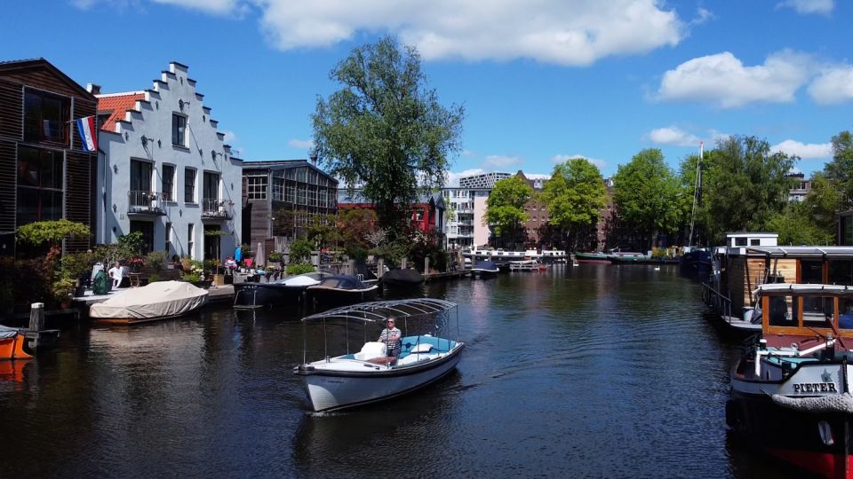 Amsterdam: Private Canal Tour - UNESCO canal district, from the waterline up