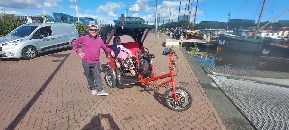 Amsterdam: Private City Highlights Tour by Rickshaw - Dam Square: where the tour builds your bearings fast