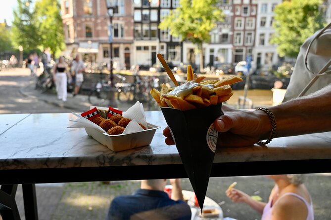 Amsterdam Private Food & Drinks Tour by UNESCO Canals & Jordaan - Chocolate at Puccini Bomboni and Dutch fries on the 9 Little Streets route