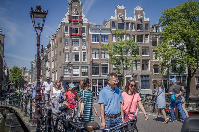 Amsterdam Private Historical Walking Tour - Dam Square, Royal Palace, and New Church: a loud opening with clear context