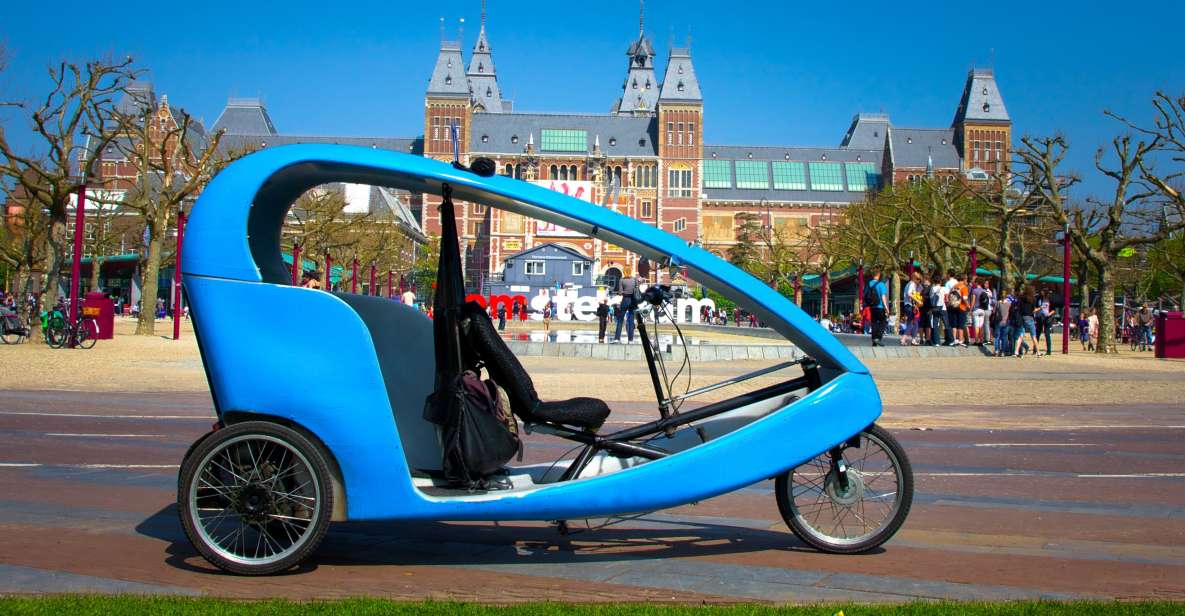 Amsterdam: Private Pedicab Historical Sightseeing Tour - Zeedijk and Nieuwmarkt: dikes, the oldest hints of Chinatown, and a 15th-century gate