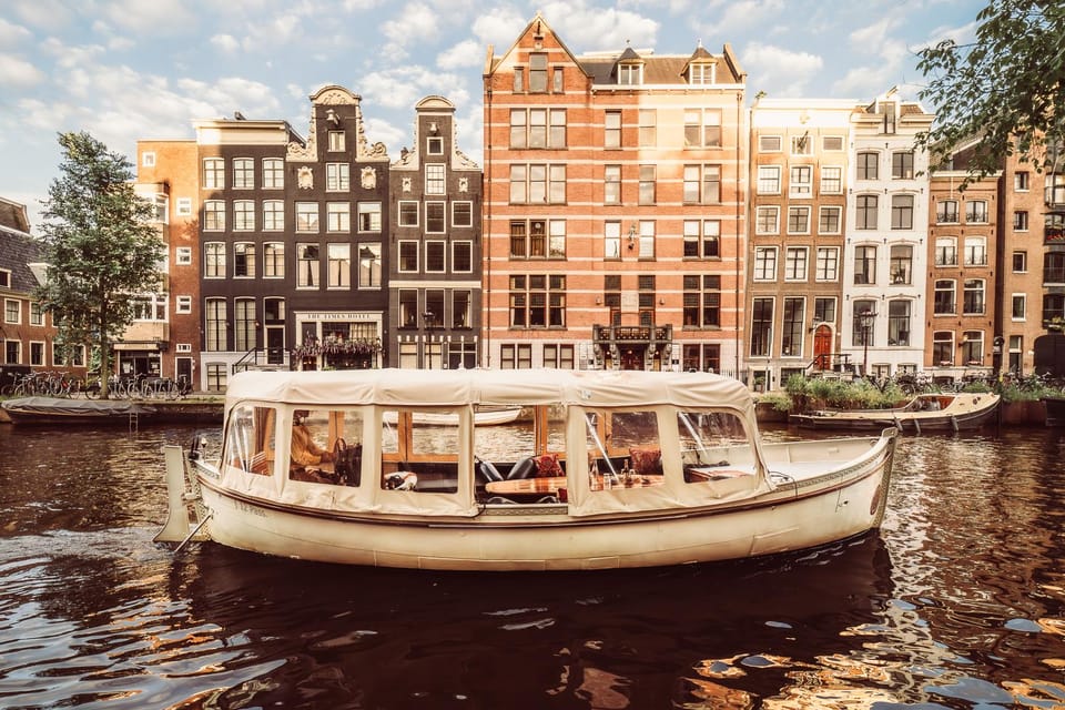 Amsterdam: Private Romantic Evening Boat Tour with Prosecco - Herengracht canal houses: the calm payoff before returning