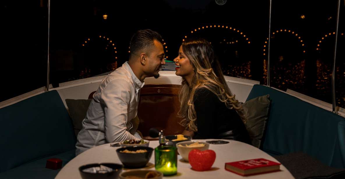 Amsterdam: Private Romantic Evening Boat Tour with Prosecco - The captain-storyteller in English, with Valentine’s style