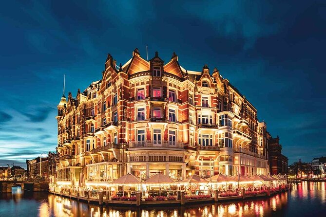 Amsterdam: Private Romantic Evening Canal Cruise + Bubbles/Snacks - Seven Bridges at night: the signature glow