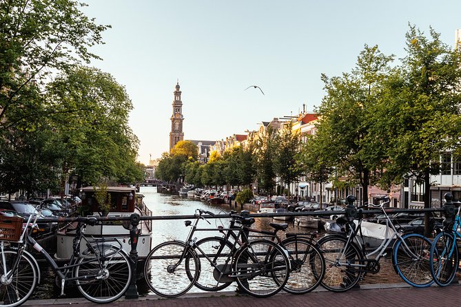 Amsterdam Private Tour: Highlights & Hidden Gems by Bike or Foot - Begijnhof Chapel: A Quiet Medieval Pause in the Middle of the City