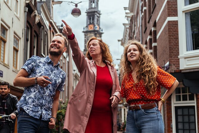 Amsterdam Private Tour: Highlights & Hidden Gems by Bike or Foot - Flower Market Stalls and the Snack That Keeps the Day Happy