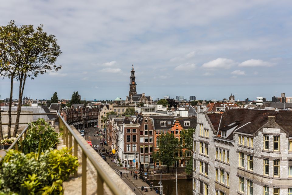 Amsterdam: Private Walking Tour of Jordaan & De 9 Straatjes - Art galleries, restaurants, and fresh markets: what your guide will point out