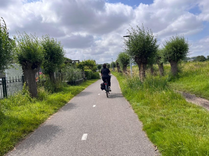 Amsterdam: Rainbow Rural Bike Tour With Local Gay Guide - The Ferry Skyline Ride: A Slower Way to See Amsterdam