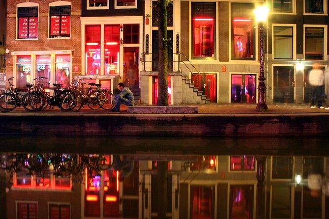 Amsterdam Red Light District and City Center Walking Tour - The Dam area and Amsterdam’s wooden-pole foundations