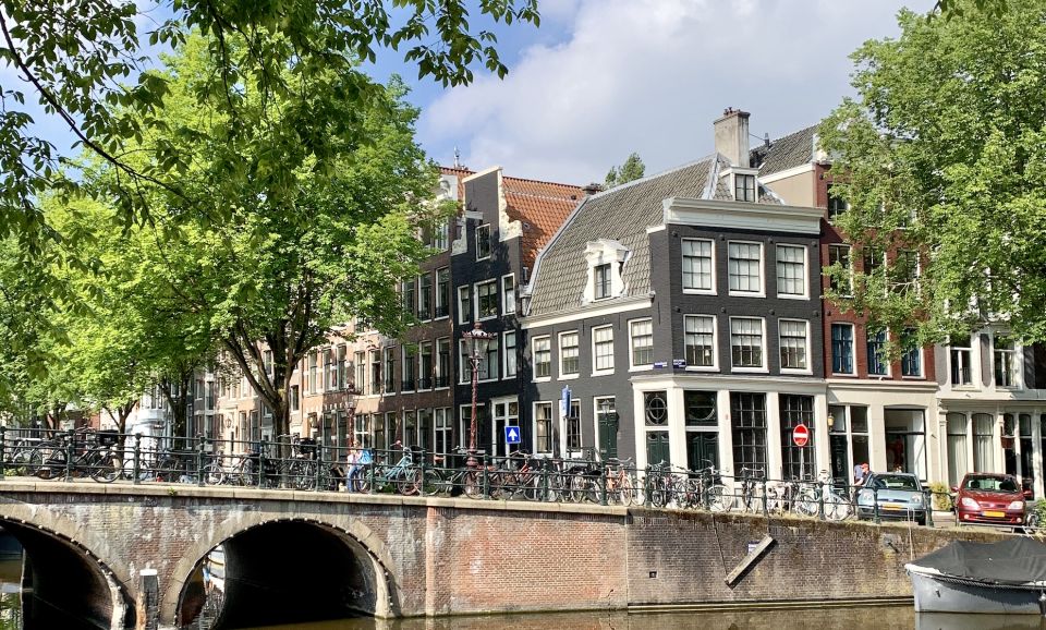 Amsterdam: Red Light District & City Tour German or English - Nieuwmarkt Square and De Waag: Closing on a Real Amsterdam Moment