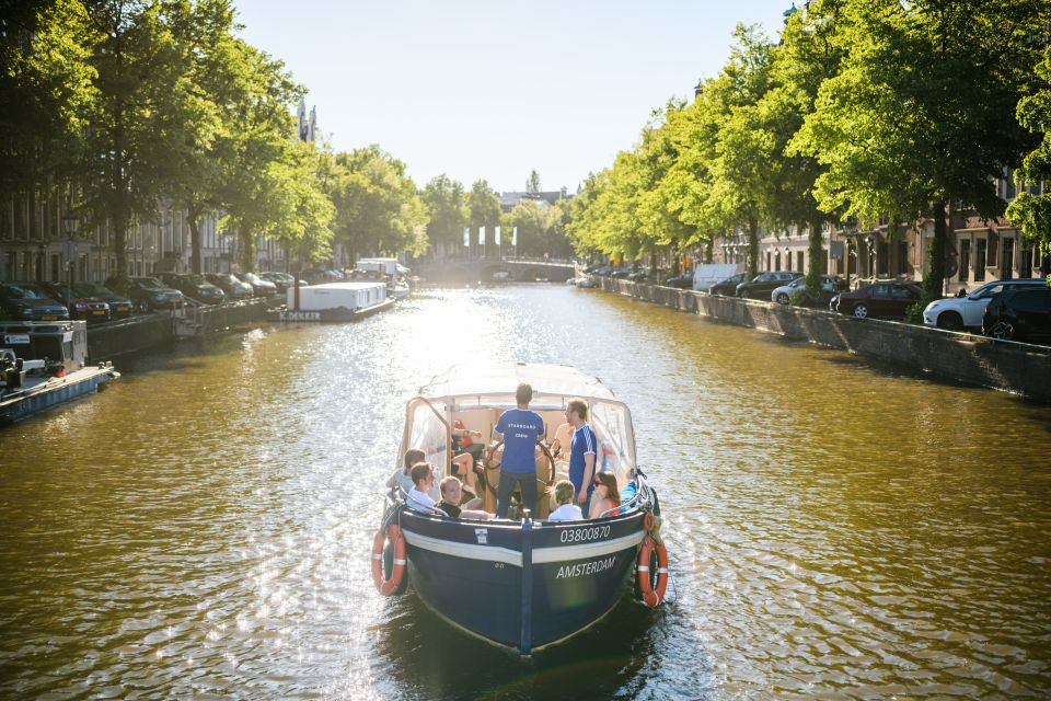 Amsterdam: Red-Light District Pub Crawl and Booze Boat Tour - Pub crawl format: 4 bars, one free-shot routine, and drinking games