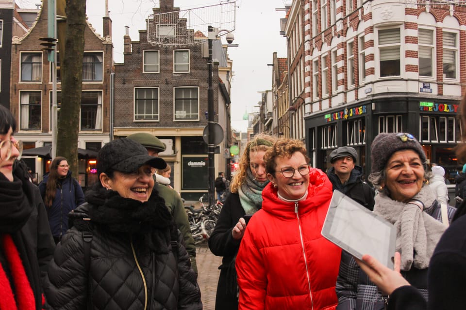 Amsterdam: Red Light District Tour - Nieuwmarkt Square: Where You Pause, Then Keep Going