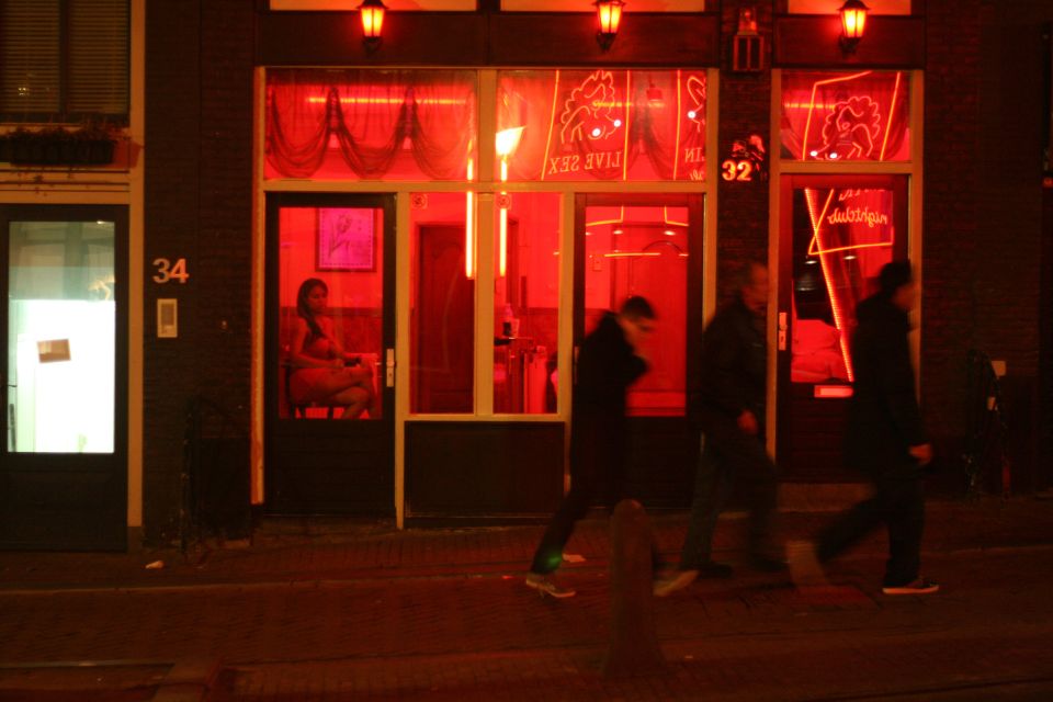 Amsterdam Red Light District tour with a local guide - Zeedijk Street first: old sailor quarter to modern rules