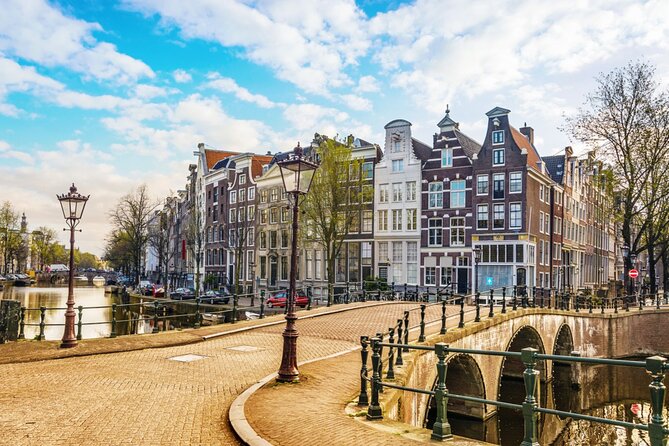 Amsterdam Red Light District Treasure: Self-Guided Tour & Quest - Old Center and the Weeping Tower: medieval Amsterdam, with human stories