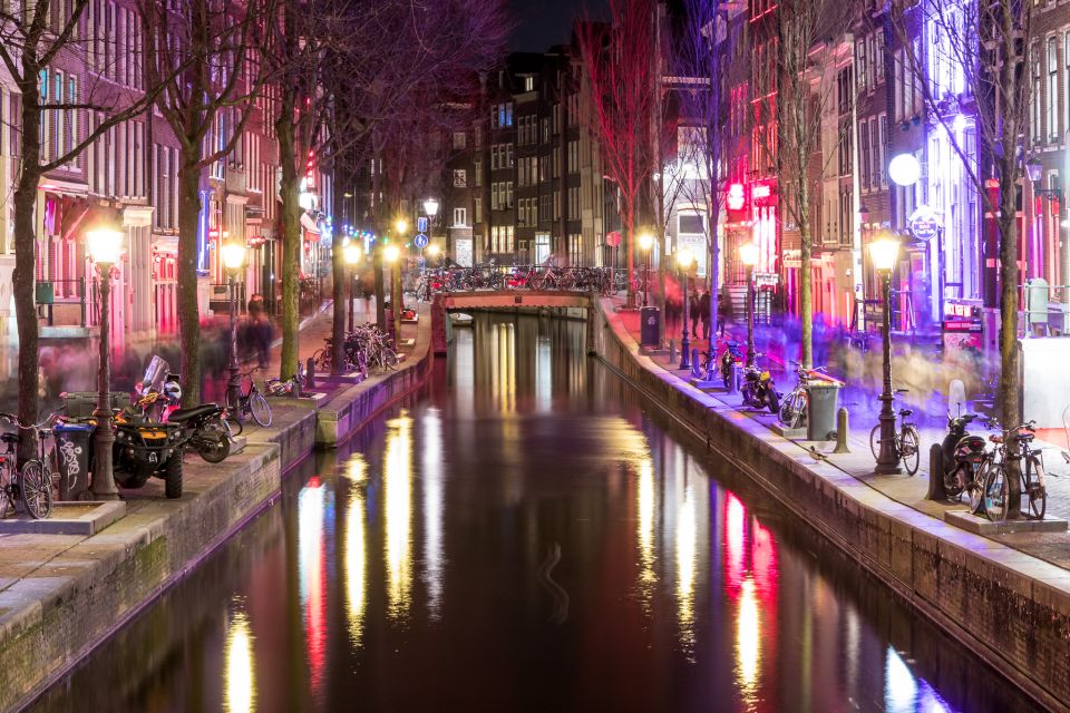Amsterdam: Red Light District walking tour - The adult-industry overview: laws, routines, and social consequences