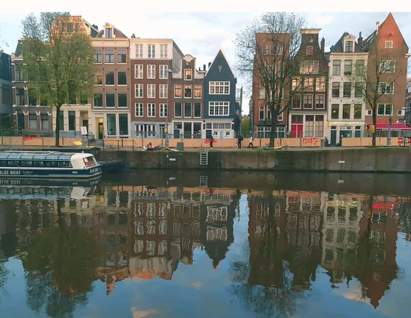 Amsterdam: Red light tour in German/English for groups of 4 people or more - China Town, New Market Square, and the Old Church Area