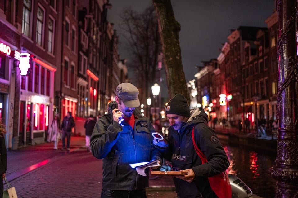 Amsterdam: Self-guided Red Light District Pub Crawl Mystery - What to bring: the charged smartphone is not optional