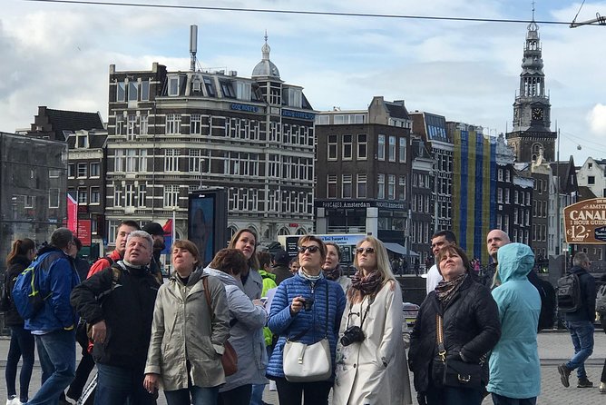 Amsterdam Sightseeing Tour + Hidden Gems + Tastings + PDF guide - Damrak food stop: Dutch cheese and stroopwafels done the smart way