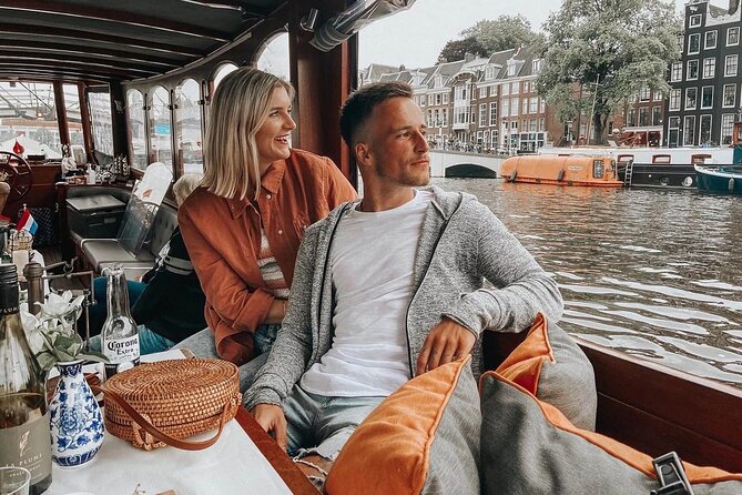 Amsterdam Small-Group Bike Tour With Canal Cruise, Drinks, Cheese - Small-group bike tour: max 10, but pace matters