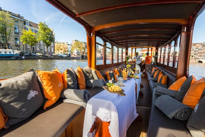 Amsterdam Small-Group Bike Tour With Canal Cruise, Drinks, Cheese - The narrowest bridge ride: a small thrill in a huge city