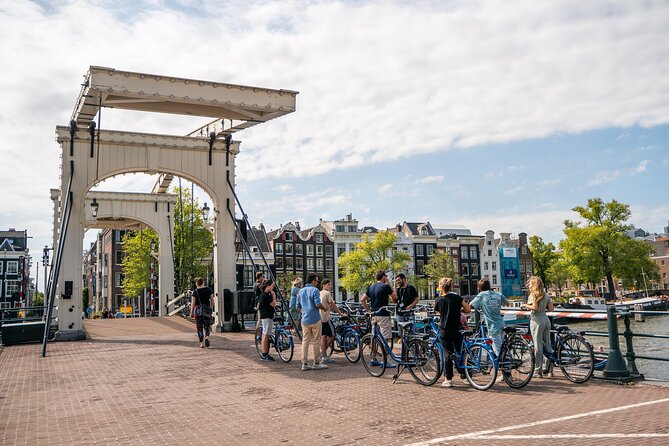 Amsterdam Small-Group Bike Tour With Optional Canal Cruise - Amsterdam Centraal to De Gooyer Windmill: classic city icons in motion