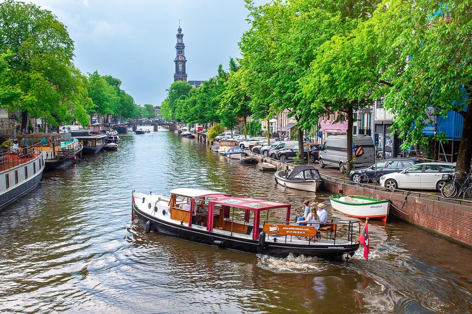 Amsterdam: Small-Group Canal Cruise incl. Drinks and Snacks - Giuliana’s electric hush: the boat that makes the whole experience feel calmer