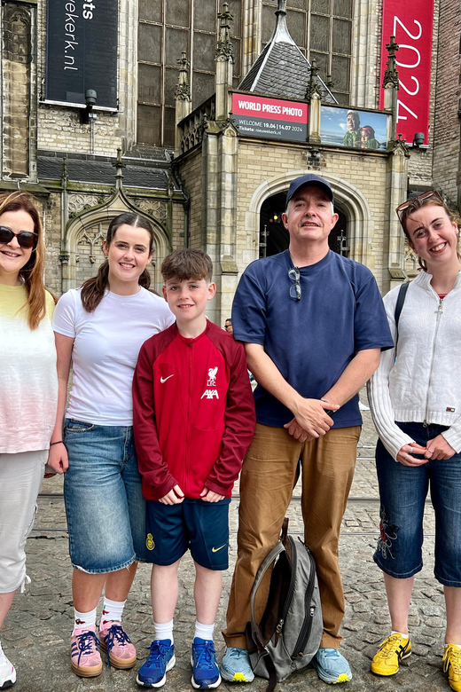 Amsterdam: Small Group Walking Tour with Fun Guide - Finding the tour: Dam Square and David’s red umbrella