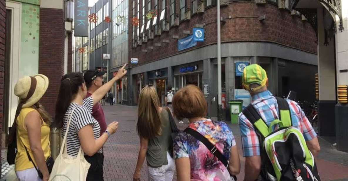 Amsterdam: The Story of History & Culture Walking Tour - Photos and small-group comfort on streets and canals