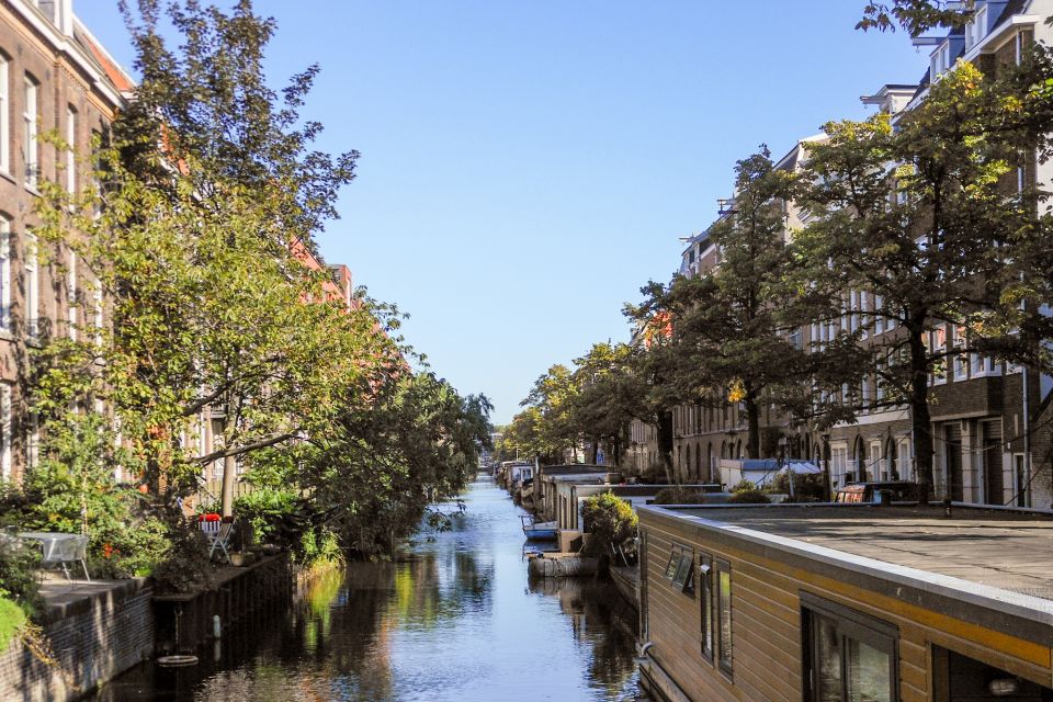 Amsterdam Walking Tour and Canal Cruise - Jordaan and a Street Market Stop for Shopping Street Energy