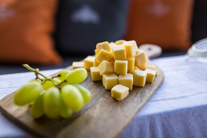 Amsterdam Walking Tour and Cruise with Drinks and Cheese Tasting - The open-boat canal cruise with drinks and cheese: the fun part