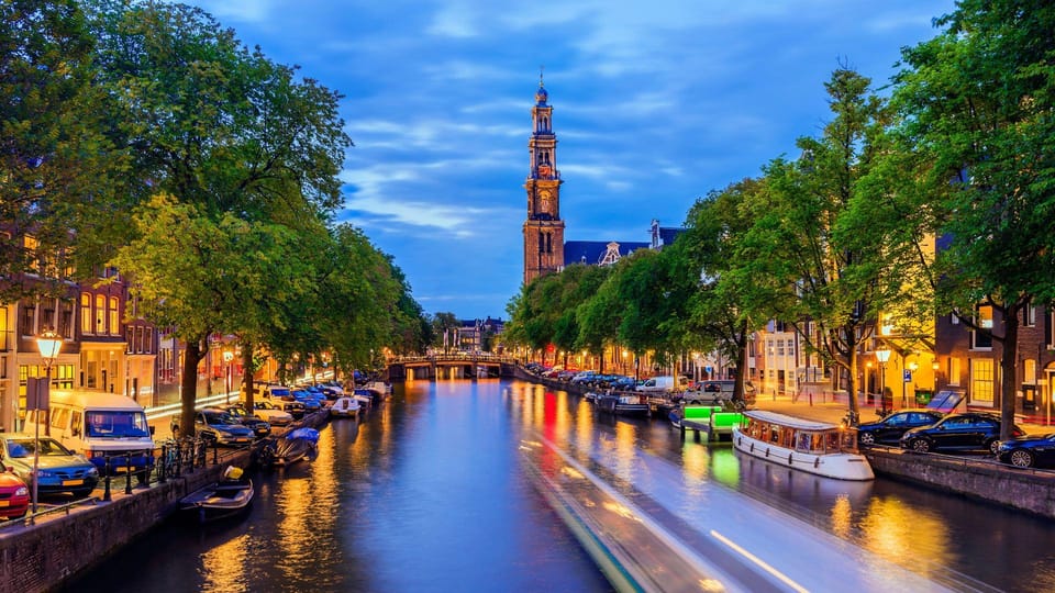 Amsterdam Walking Tour with a Local - Visiting top attractions without losing the thread