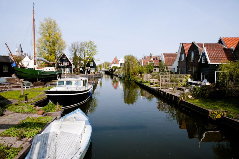 Amsterdam: Windmills, Edam, Volendam and Marken Private Tour - Zaanse Schans windmills: preserved streets and working craft