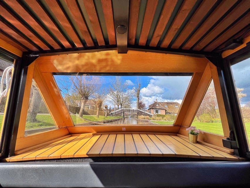 Amsterdam: Zaanse Schans and Giethoorn Day Trip with Cruise - Giethoorn boat cruise: car-free calm you can feel