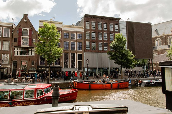 Anne Frank and Jewish Culture Private Walking Tour in Amsterdam - Stop 2: Zuiderkerk, a church with Rembrandt and Monet links