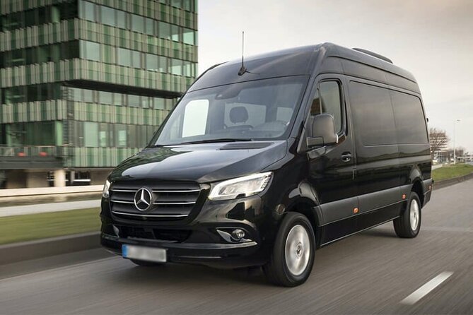 Arrival Private Transfer Amsterdam Airport to Amsterdam City Center by Minibus - Chauffeur Help That Actually Helps