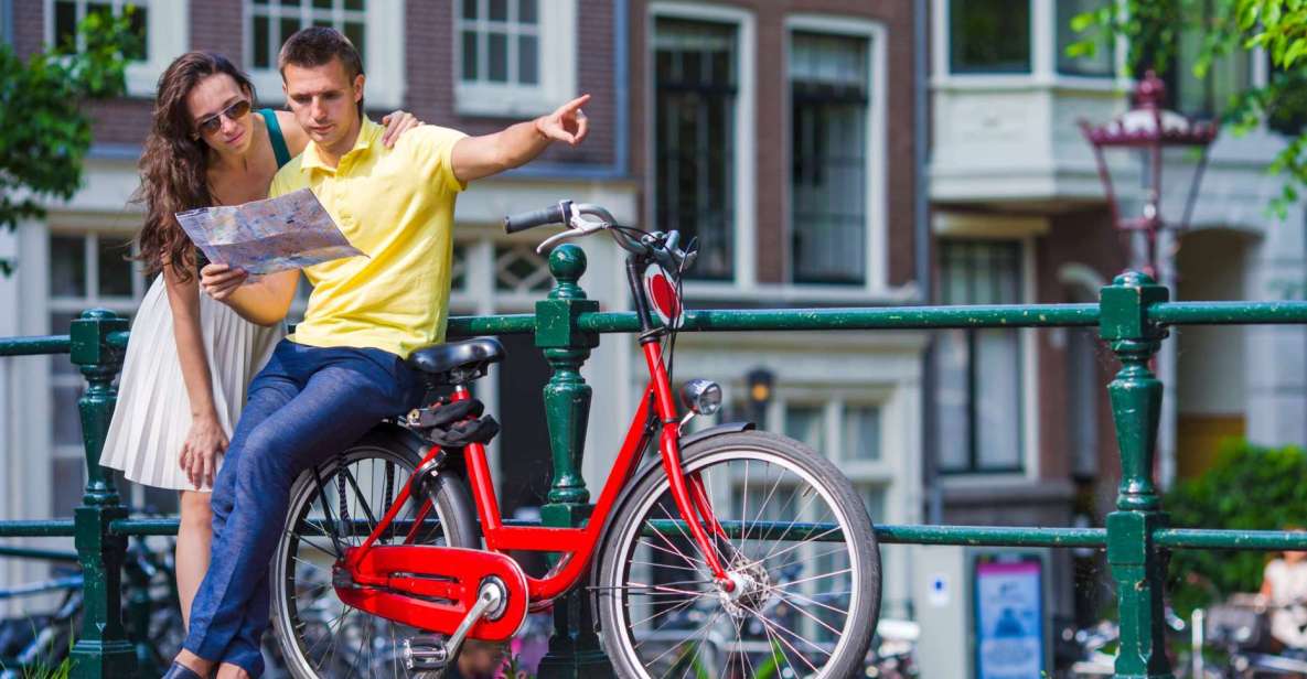 Bike Tour of Amsterdam Old Town, Top Attractions and Nature - Dam Square to Central Station: Royal Palace, New Church, and a Red Light District Pass