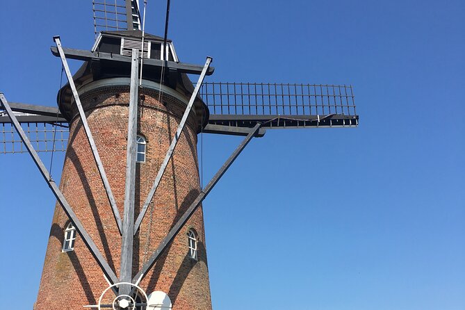 Bruges Private Custom Tour from Amsterdam - Delta Works and Neeltje Jans: Dutch Engineering at Full Power