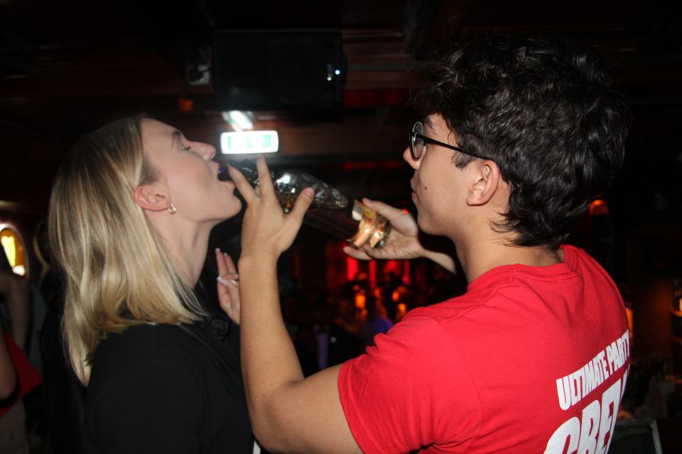 City Centre and Red Light Pub Crawl: 2 Night Pass - Hosts, games, and the QR-to-WhatsApp route when street guiding isn’t allowed