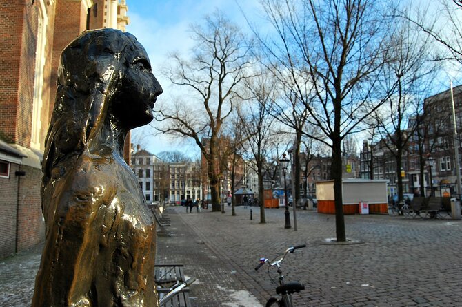 Cursed Houses of Jordaan: Self-Guided Mystery Walk in Amsterdam - Anne Frank area stop: a monument and a postcard-style first thread