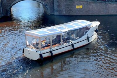 Dutch Cheese & Drinks Guided Amsterdam Boat Tour, All Inclusive - Starting in Medieval Amsterdam: Narrow Canals and Quiet Corners