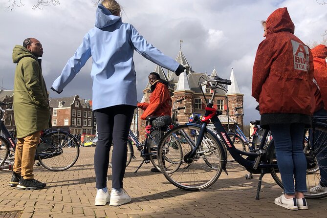 E-Bike Tour, Amsterdam's Highlights and Hidden Gems - Amstelveld and Magere Brug: canal belt stories and houseboat views